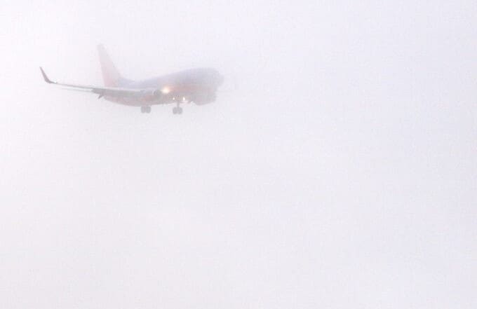 Airplane in the fog