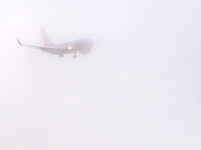 Airplane in the fog