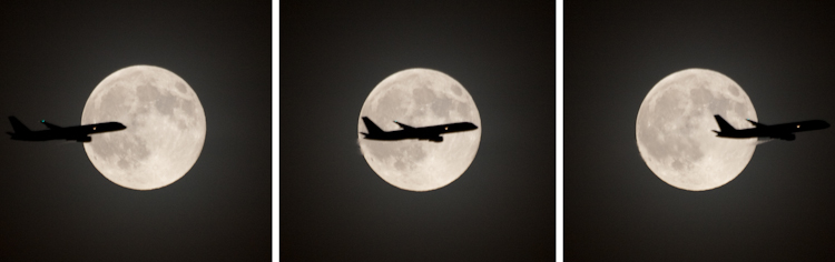Airplane flying across full moon in Seattle