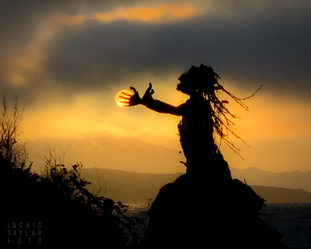 Supplicating Figure Capturing the Sun at Albany Bulb