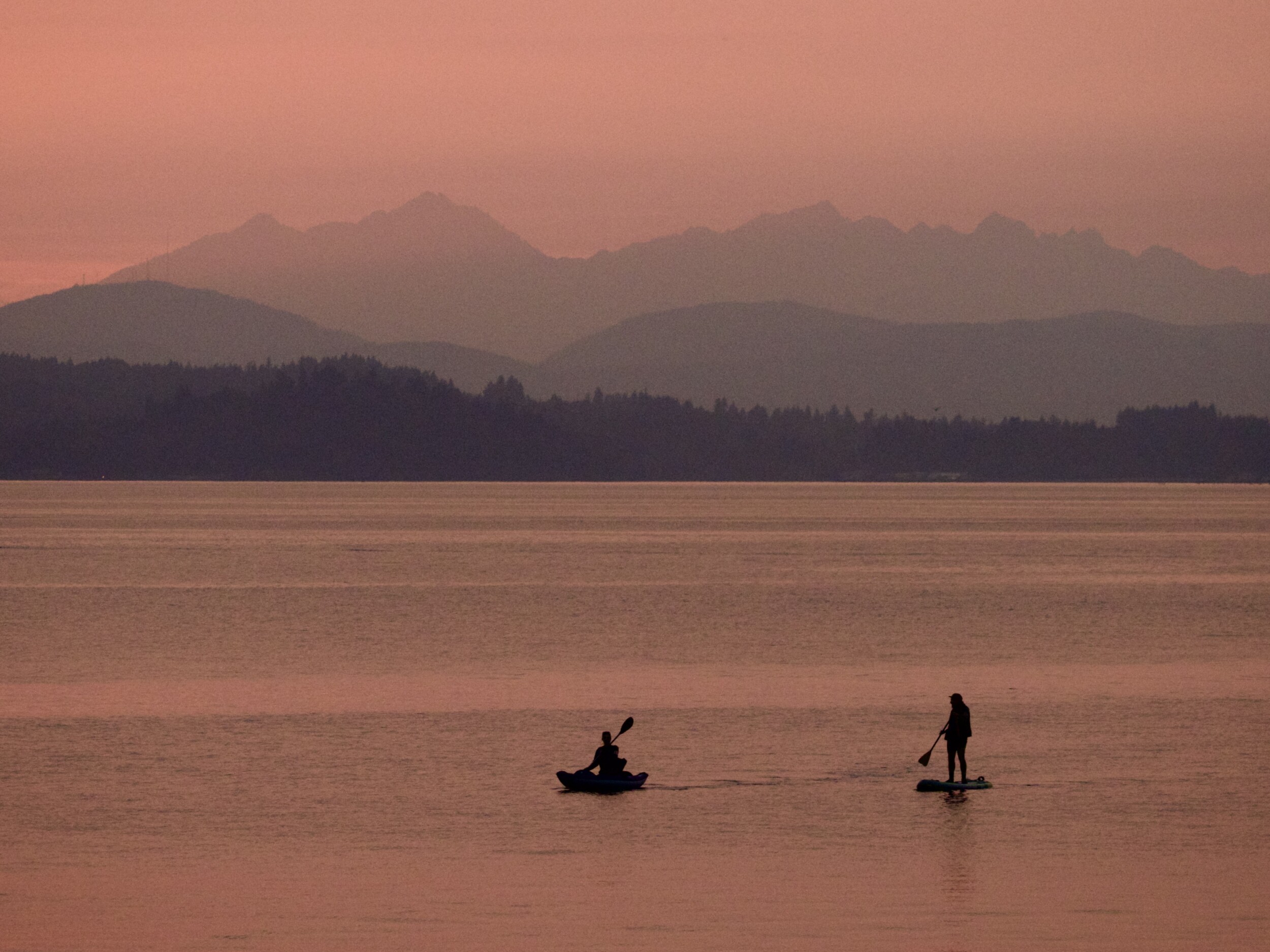 Paddlers and Puget Sound Sunset with Wildfire Smoke