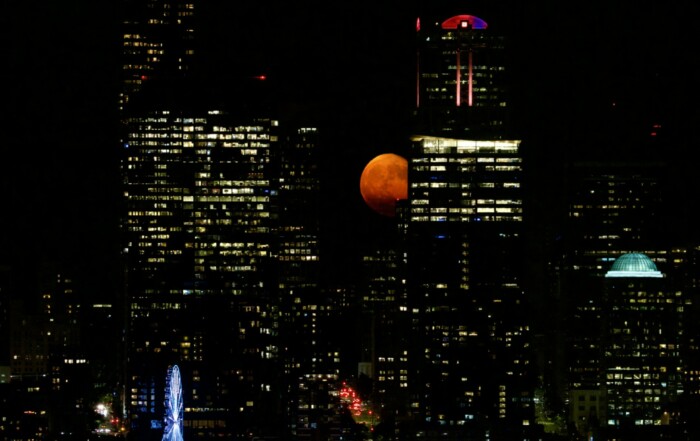 Orange Moon Over Seattle City Skyline