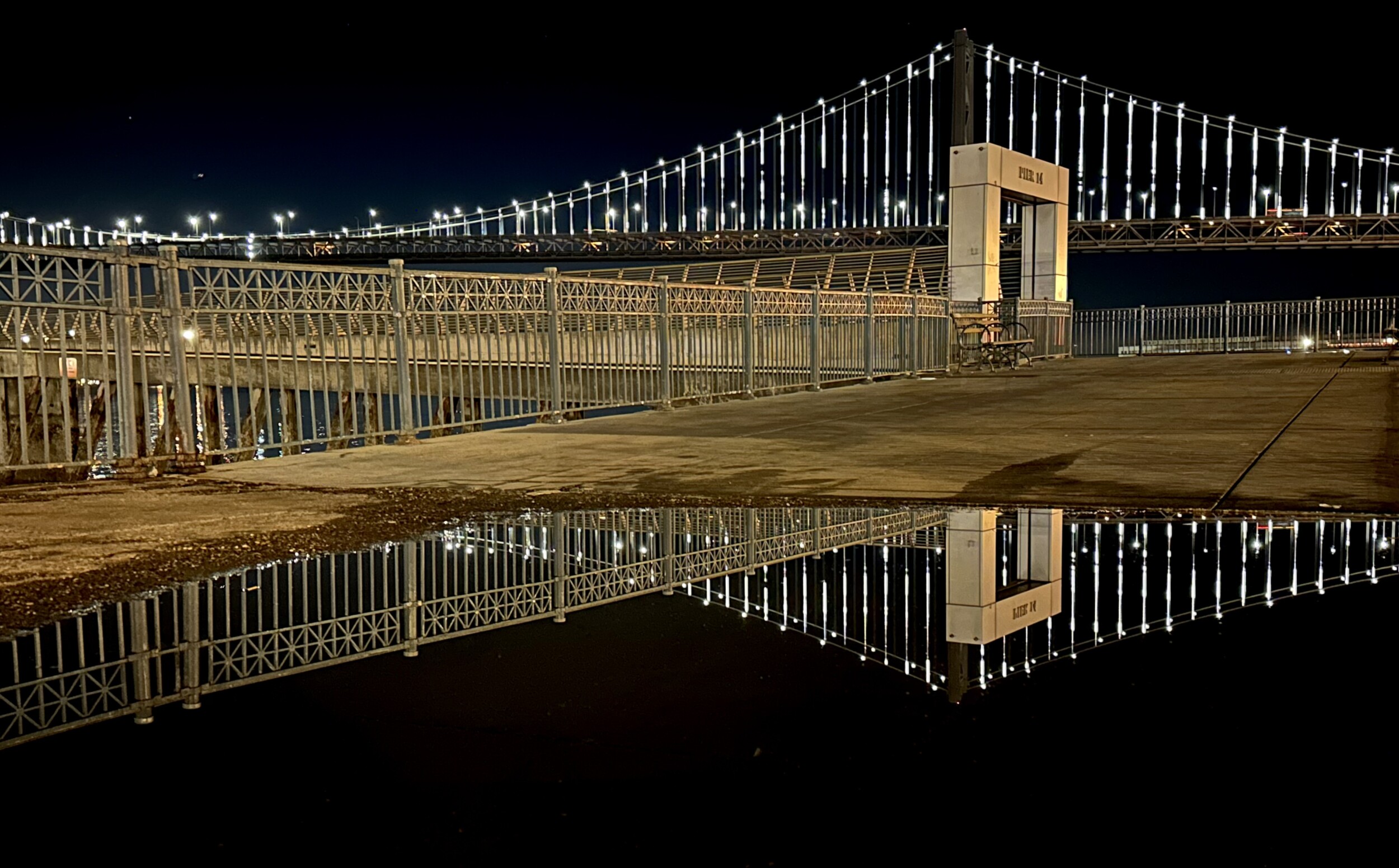 San Francisco Pier 14 Reflected in Puddle