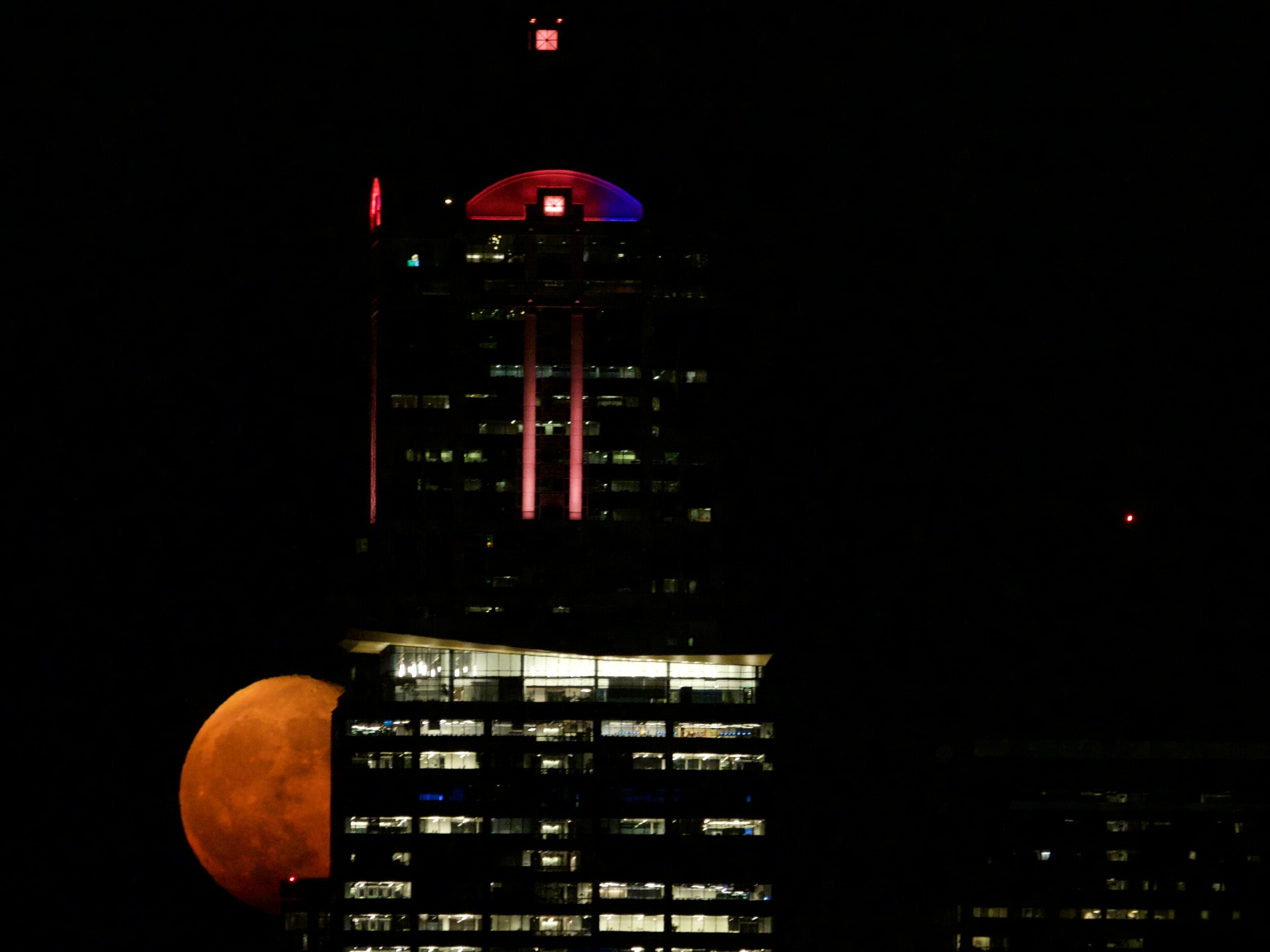 Orange Full Moon Over City of Seattle
