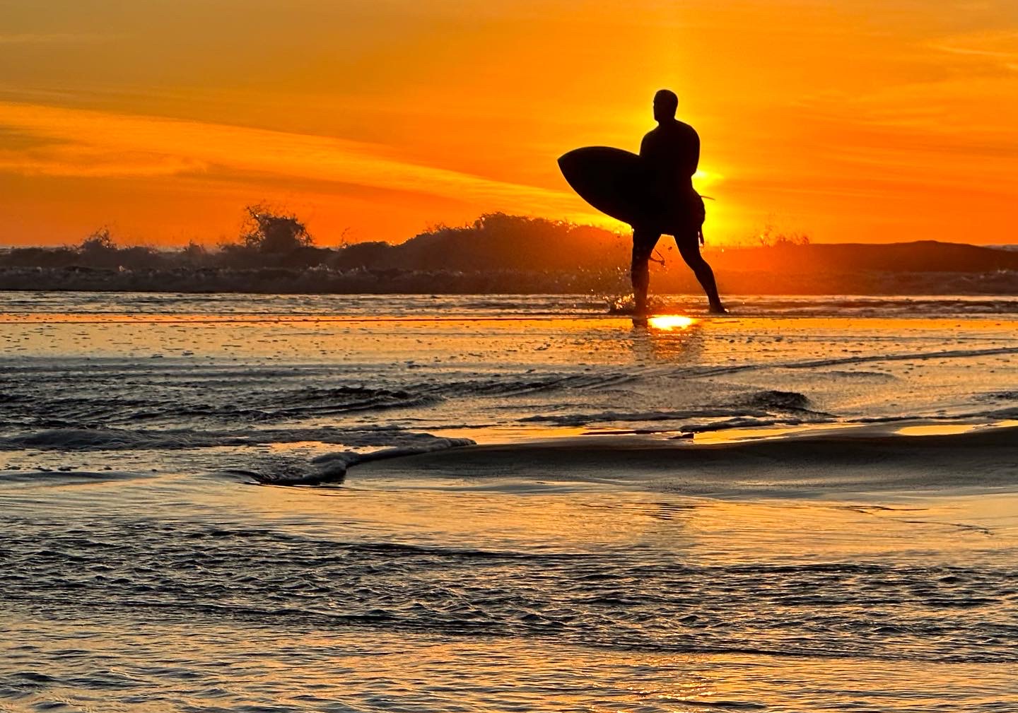 Surfer Silhouette at Sunset on Ocean Beach San Francisco