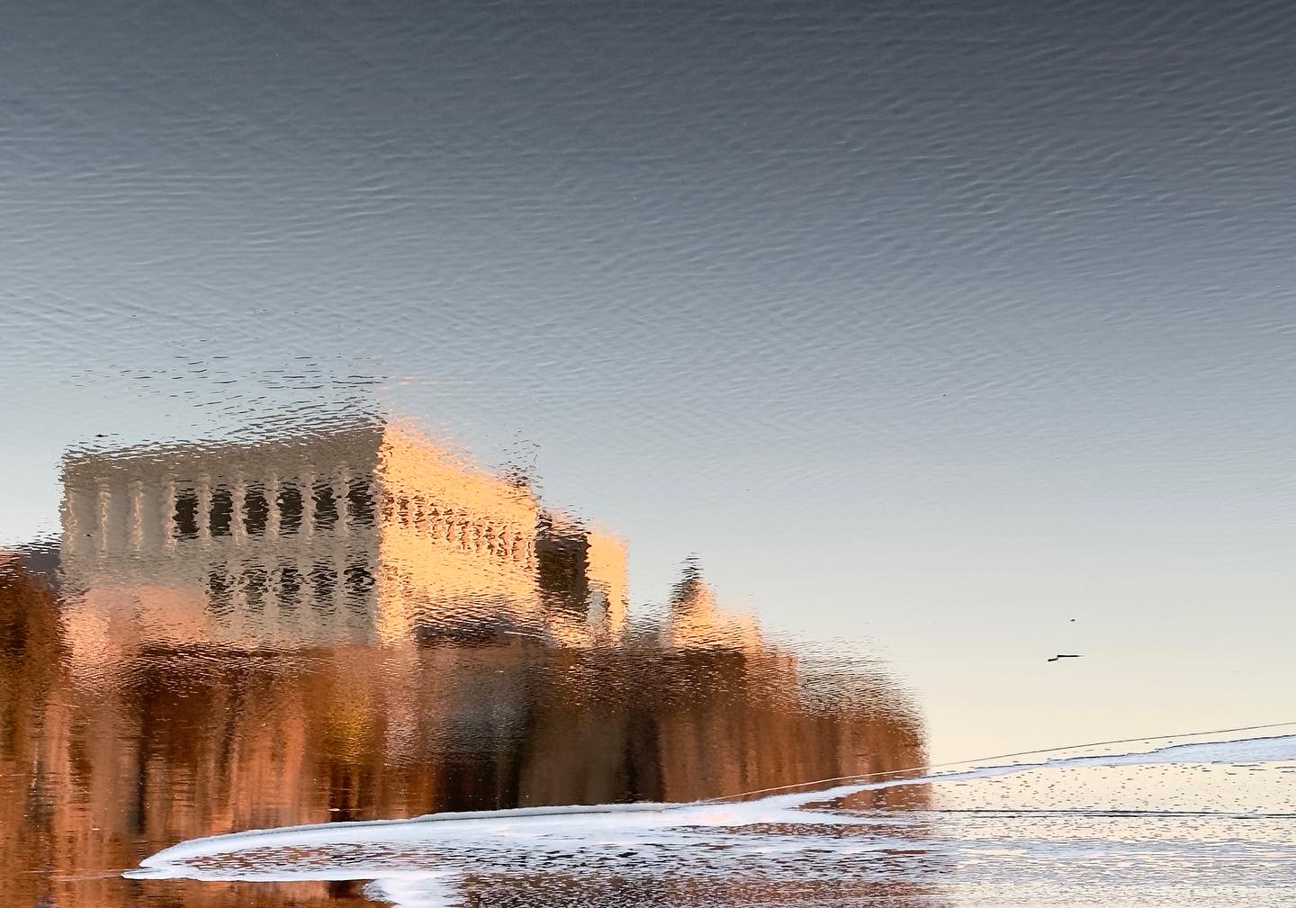 Reflection of San Francisco Cliff House at Low Tide